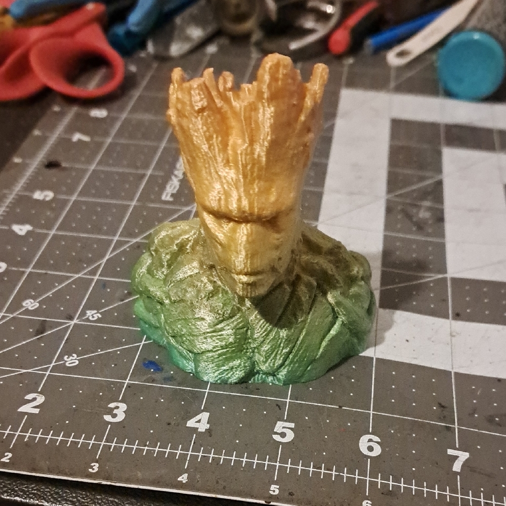 Gold and Green Groot Figurine
